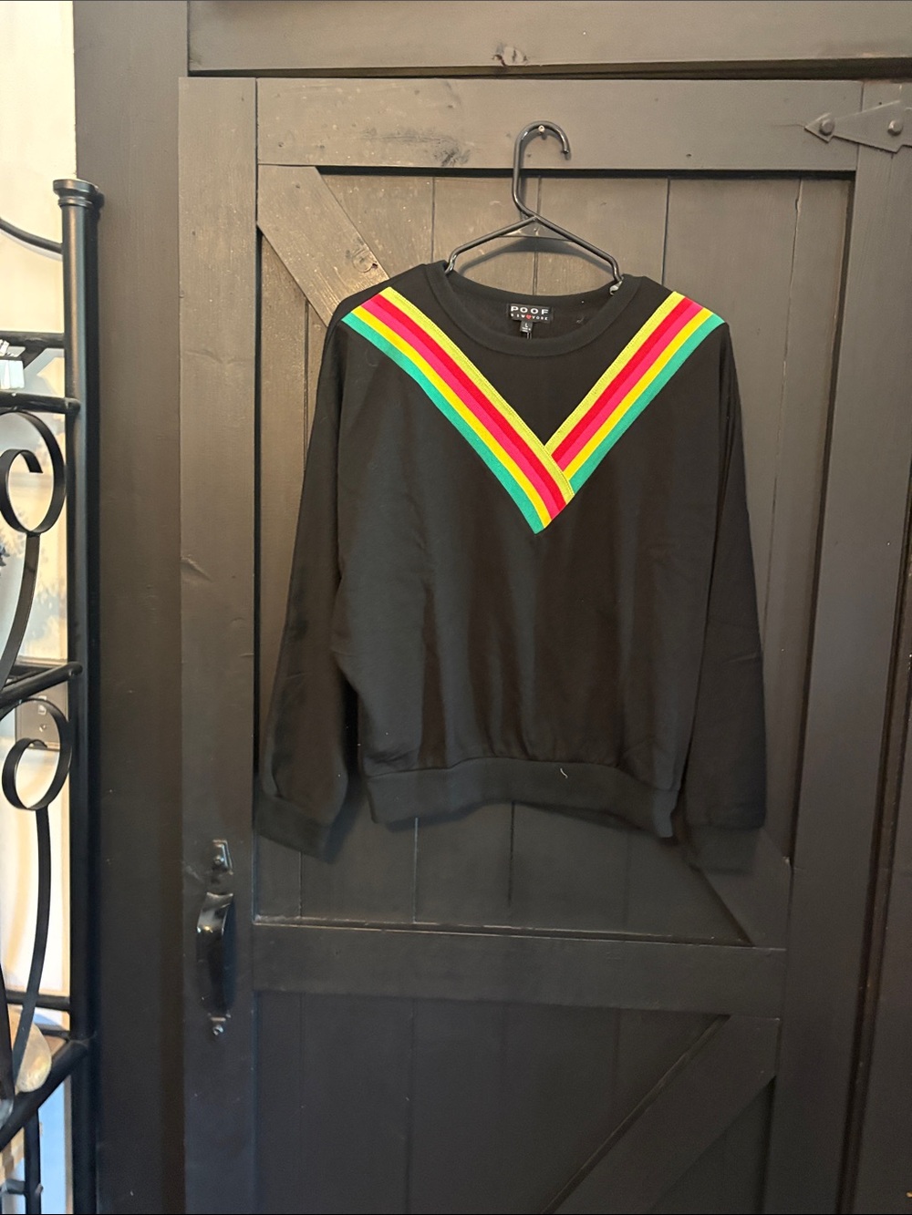 Poof! Black Pullover Sweatshirt with Neon Rainbow V-Stripes